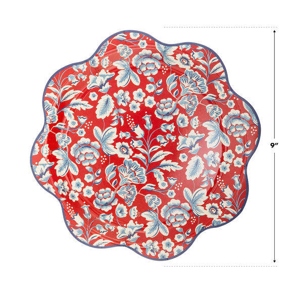 Rust-red paper plate with scalloped wavy edge, white and blue floral botanical pattern, 9 inches