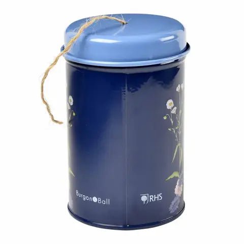 Dark navy cylindrical tin with blue lid, decorated with botanical illustrations, jute twine handle