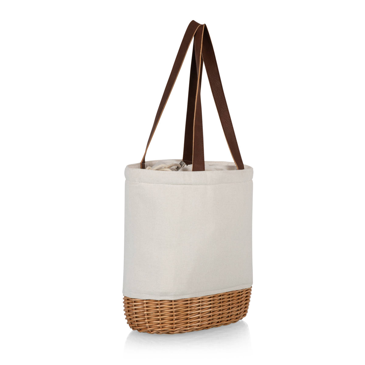 Cream canvas tote with natural wicker base and brown leatherette handles