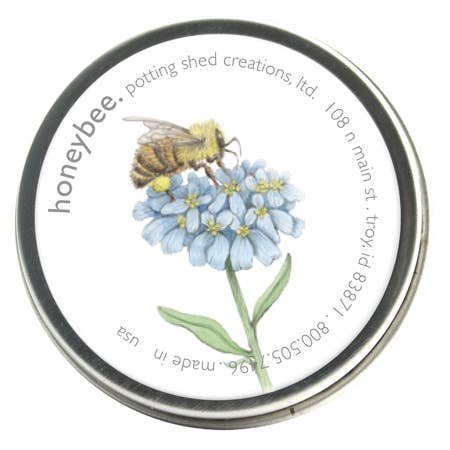 Honeybee seed packet with blue flowers and green stem in metal tin labeled Potting Shed Creations