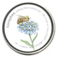 Honeybee seed packet with blue flowers and green stem in metal tin labeled Potting Shed Creations