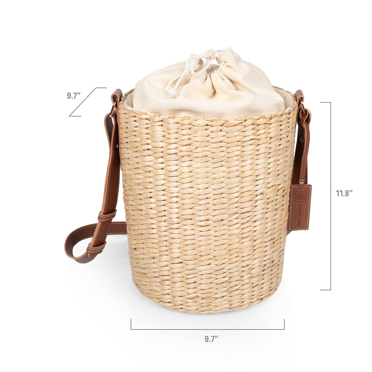 Beige handwoven rush bucket tote with brown leather shoulder straps and drawstring closure