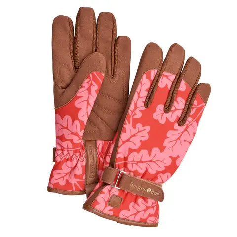 Brown and pink leaf-patterned gardening gloves with suede palm and padded fingers, wrist cuff closure