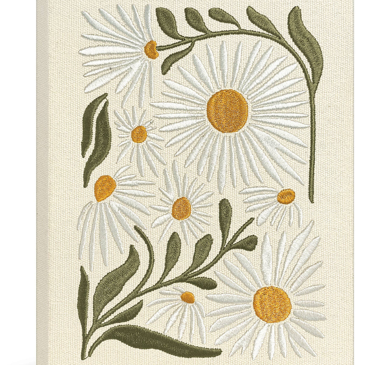Cream hardcover journal with embroidered white daisy flowers, golden centers, and green leaf stems