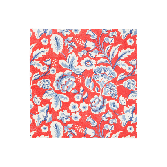 Red cocktail napkin with white and blue floral pattern featuring stylized flowers, leaves, and botanical details throughout the design