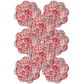 Set of six rust-colored paper plates with scalloped edges and white floral pattern