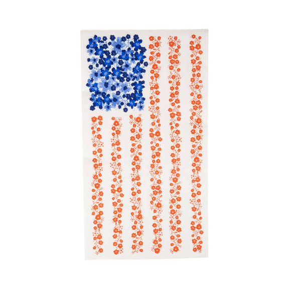 Blue and red polka dot dinner napkin with flag-inspired design on white background