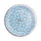Blue and white floral patterned paper plate with coral rim, shown flat