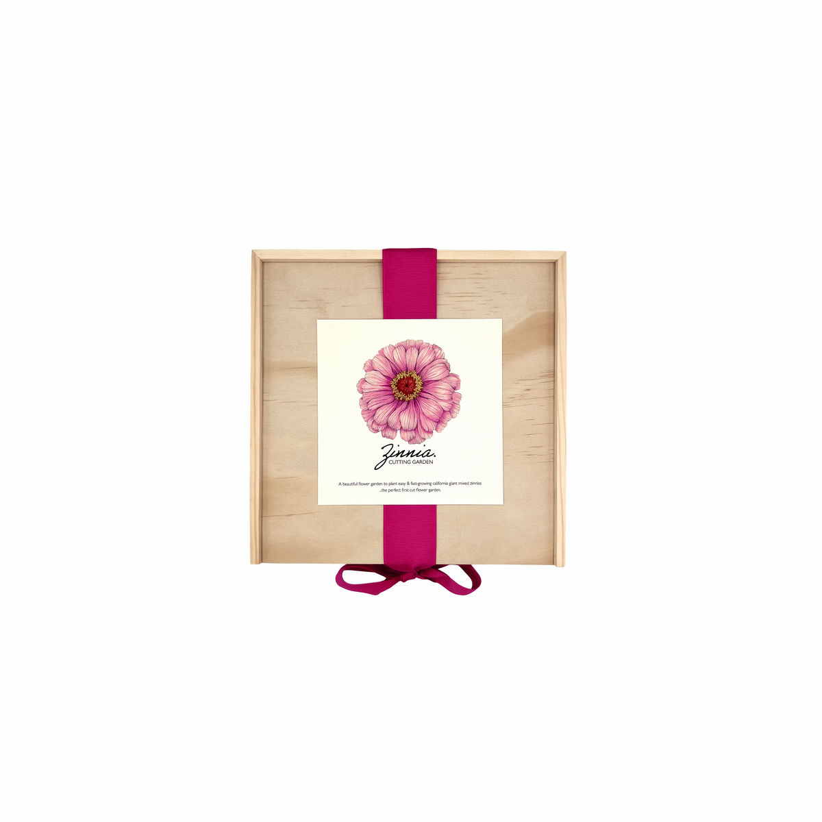 Wooden garden box with white card insert featuring pink gerbera daisy illustration, tied with burgundy ribbon bow