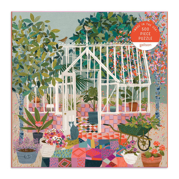 Illustrated 500-piece jigsaw puzzle showing a white-framed greenhouse filled with potted plants, flowers, and succulents in vibrant greens, pinks, and corals