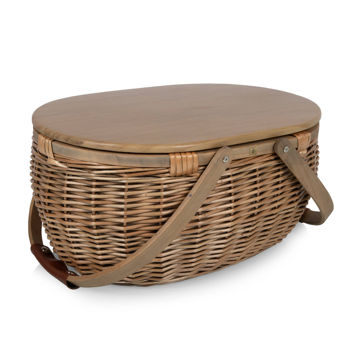 Beige wicker picnic basket with wood lid and tan fabric handles