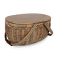 Beige wicker picnic basket with wood lid and tan fabric handles
