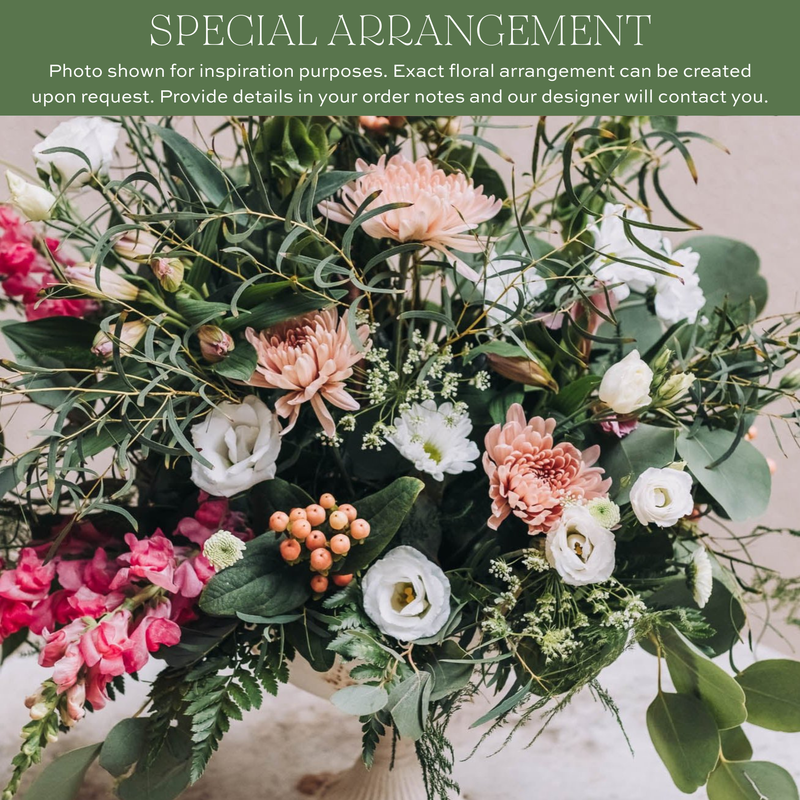 Lush mixed floral arrangement with pink peonies, hot pink spray roses, white roses, coral berries, and cascading green foliage in a dense, romantic display.