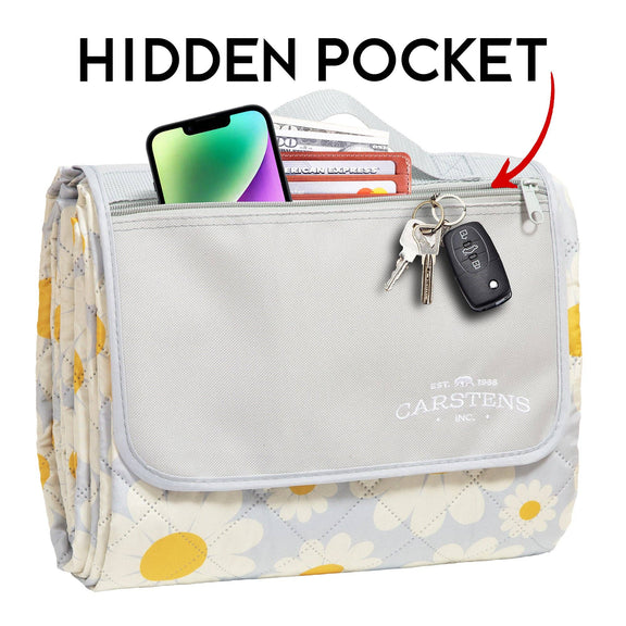 White polyester toiletry bag with yellow daisy print, gray front panel with hidden pocket feature, Carstens branding