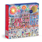 Celebrate the USA 500-piece foil puzzle box featuring Michael Storrings' patriotic illustration of a bustling boardwalk scene with colorful fireworks, festive crowds, and red brick buildings decorated for Independence Day
