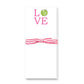 White notepad with "LOVE" in pink letters, tennis ball illustration replacing the O, and pink striped bow detail
