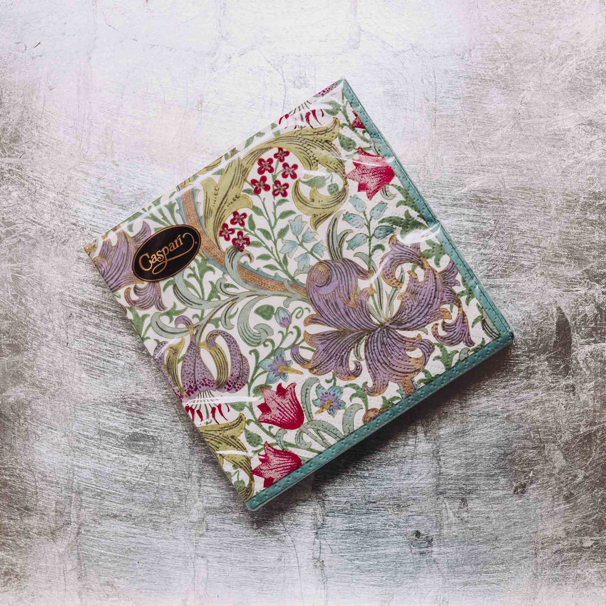 Indulge in luxury with our Caspari triple-ply Cocktail Napkins. Made in Germany, these napkins feature exquisite artwork and designs from around the world, printed with nontoxic, water-soluble dyes and food-safe ink. Elevate your entertaining with sophistication and taste. Comes in sets of 20 napkins in 17 different designs.