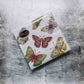 Indulge in luxury with our Caspari triple-ply Cocktail Napkins. Made in Germany, these napkins feature exquisite artwork and designs from around the world, printed with nontoxic, water-soluble dyes and food-safe ink. Elevate your entertaining with sophistication and taste. Comes in sets of 20 napkins in 17 different designs.