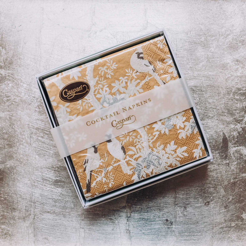 Indulge in luxury with our Caspari triple-ply Cocktail Napkins. Made in Germany, these napkins feature exquisite artwork and designs from around the world, printed with nontoxic, water-soluble dyes and food-safe ink. Elevate your entertaining with sophistication and taste. Comes in sets of 20 napkins in 17 different designs.
