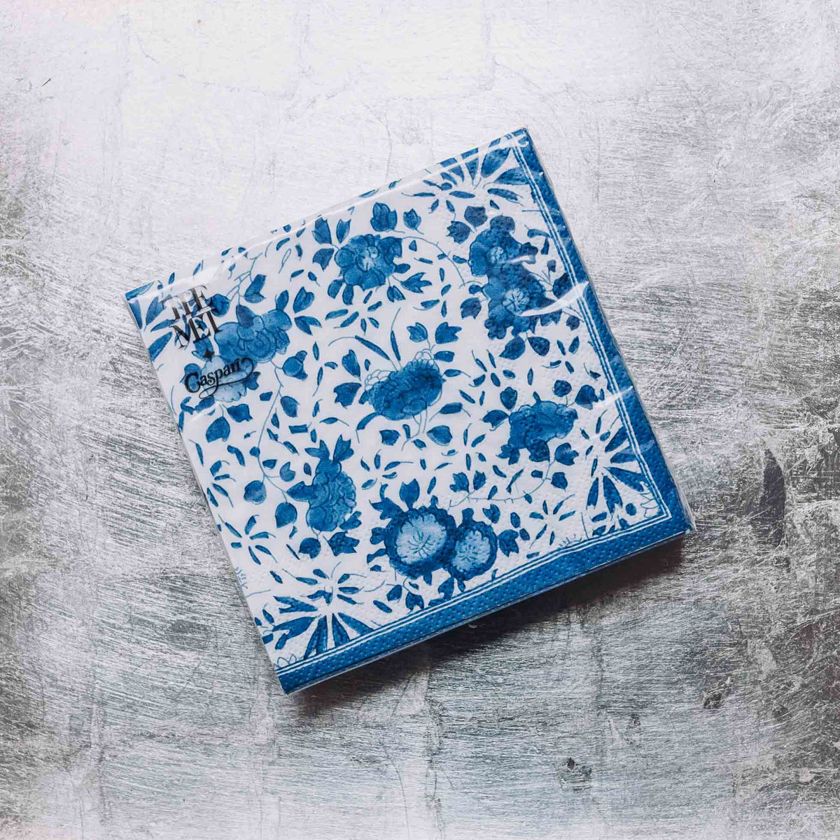Indulge in luxury with our Caspari triple-ply Cocktail Napkins. Made in Germany, these napkins feature exquisite artwork and designs from around the world, printed with nontoxic, water-soluble dyes and food-safe ink. Elevate your entertaining with sophistication and taste. Comes in sets of 20 napkins in 17 different designs.