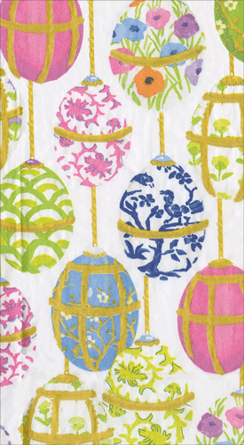 Colorful paper guest towels featuring hanging Easter eggs with floral and geometric patterns in pink, blue, and gold