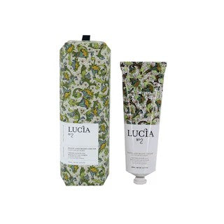 Lucia hand cream in pillow box and tube with green botanical floral packaging