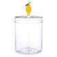 Clear glass storage canister with yellow lemon-shaped lid finial and green leaf accent