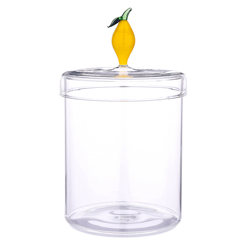 Clear glass storage canister with yellow lemon-shaped lid finial and green leaf accent