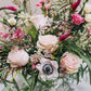This exquisite blend of lush, textured foliage, vibrant deep pink snapdragons, and delicate light pink anemones crafts an elegant arrangement that radiates joy. Named for a southeast Georgia town celebrated for its captivating charm and tight-knit community spirit.