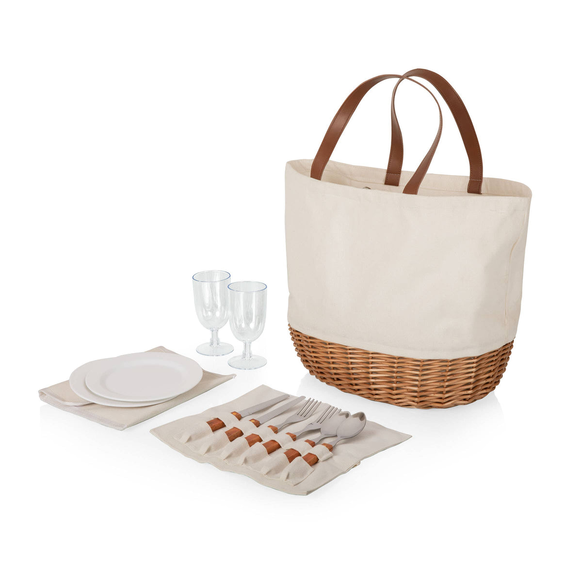 Promenade picnic basket set with cream canvas tote, willow base, brown leather handles, serving plates, wine glasses, and utensil wrapping for two