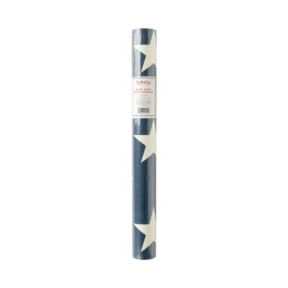 Rolled navy blue disposable table runner with cream stars, packaged with My Mind's Eye label