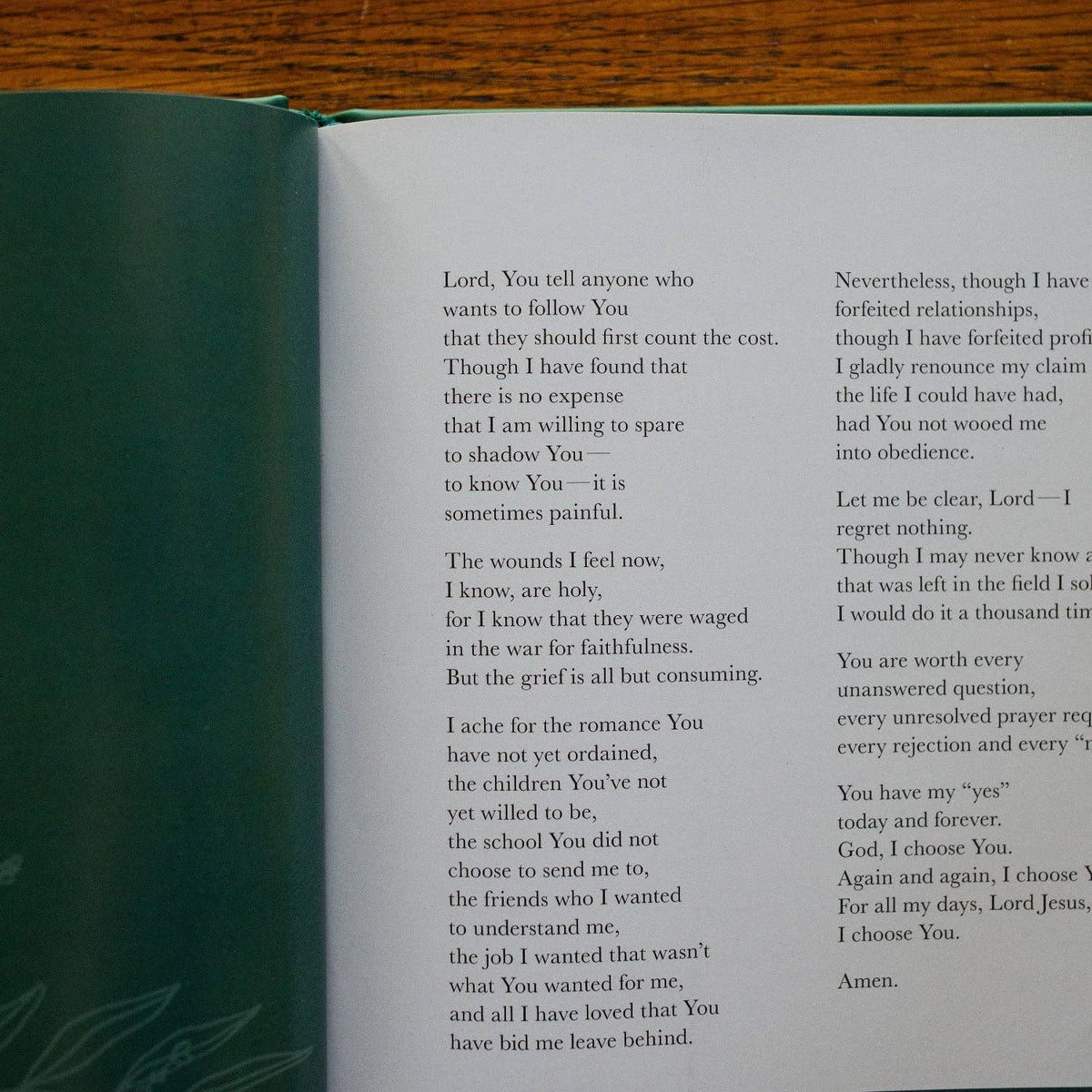 Open book with teal cloth cover displaying pages of religious prayers and liturgies titled 'Draw Near to God'