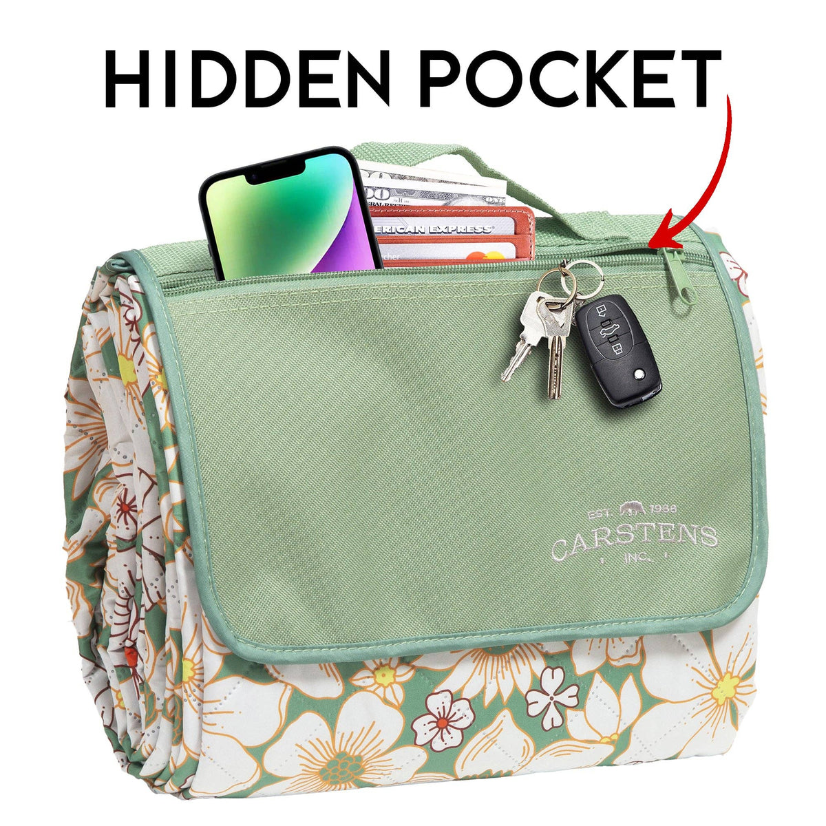 Sage green canvas picnic organizer with floral daisy-print sides, multiple storage pockets, and carry handles