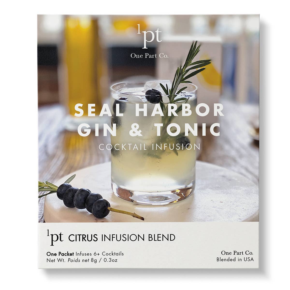 Seal Harbor Gin & Tonic cocktail infusion packet by One Part Co., showing clear mixed drink garnished with fresh rosemary and black olives