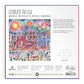 Celebrate the USA 500-piece foil puzzle box by Chronicle Books, featuring Michael Storrings' detailed illustration of a colorful boardwalk with fireworks, crowds, and festive Americana