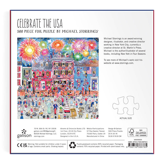 Celebrate the USA 500-piece foil puzzle box by Chronicle Books, featuring Michael Storrings' detailed illustration of a colorful boardwalk with fireworks, crowds, and festive Americana