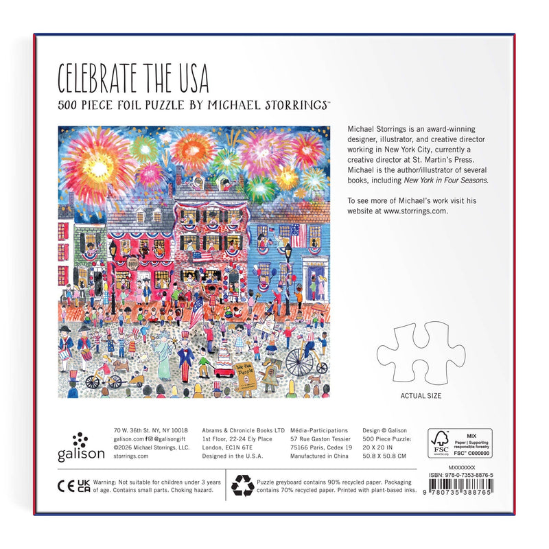 Celebrate the USA 500-piece foil puzzle box by Chronicle Books, featuring Michael Storrings' detailed illustration of a colorful boardwalk with fireworks, crowds, and festive Americana