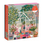 White greenhouse with hanging plants, pink seating, and colorful patterned garden tools on illustrated puzzle box