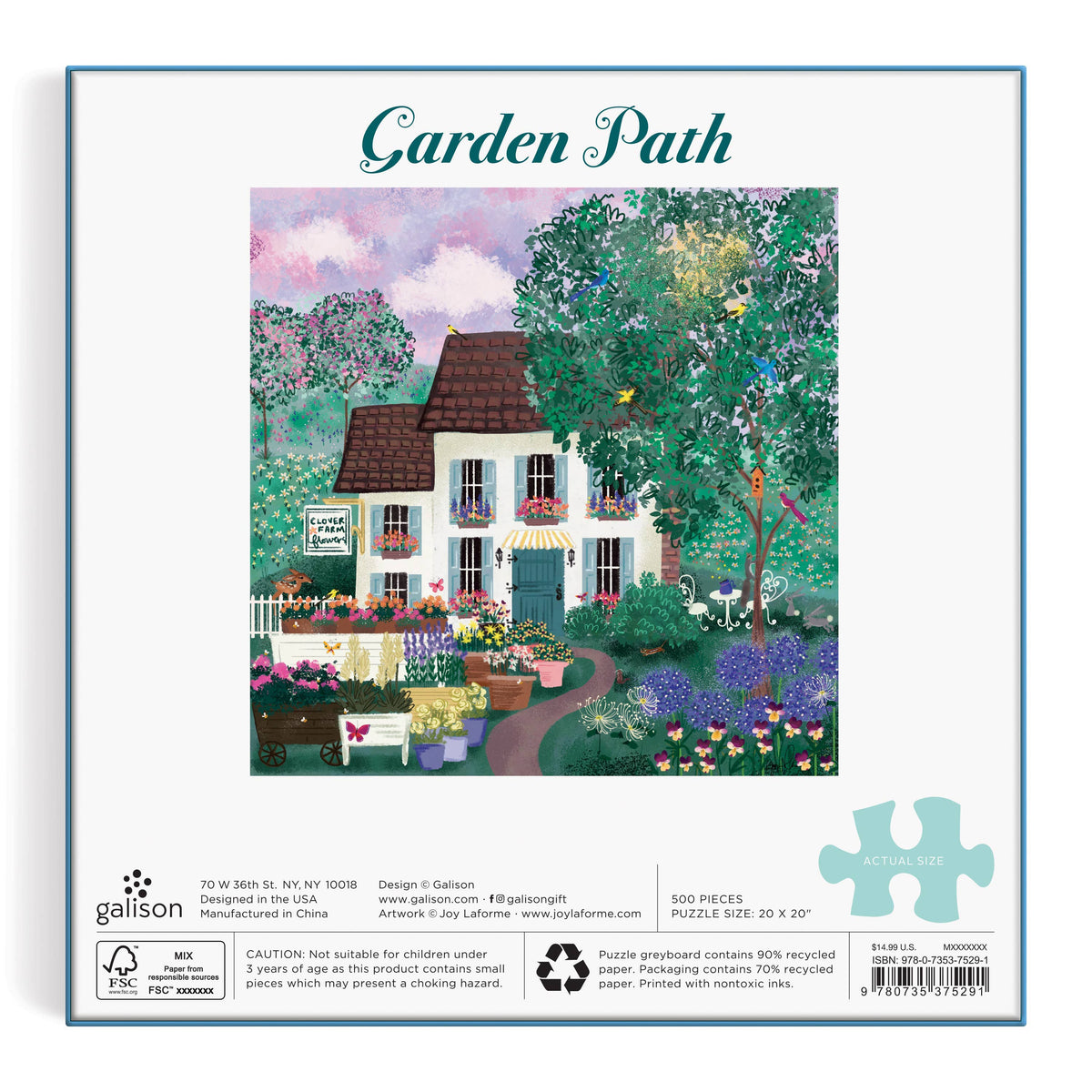 Garden Path 500-piece puzzle featuring a white cottage with brown roof surrounded by blooming flowers, green foliage, and a brick pathway.